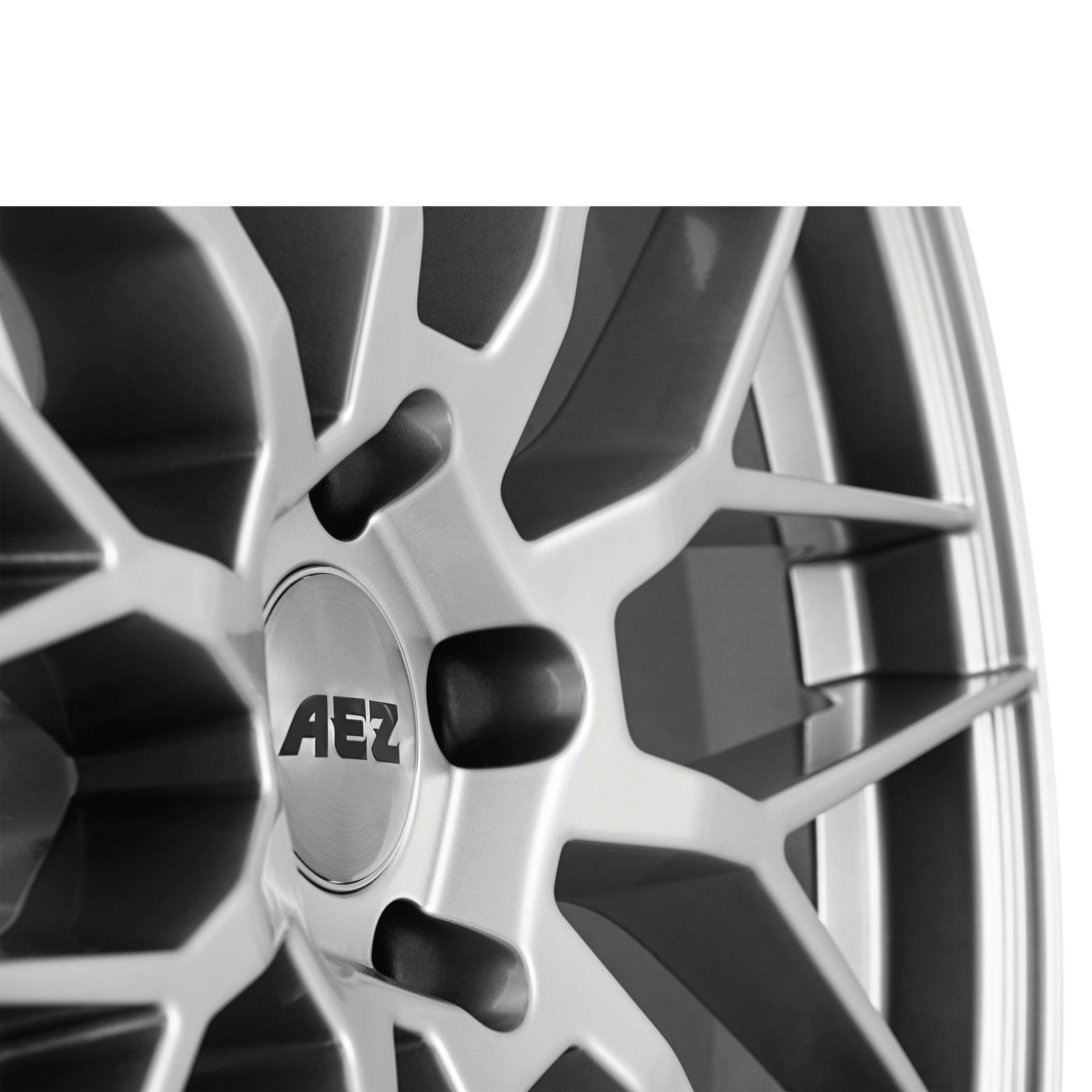 AEZ Crest silver alloy wheel cross-spoke close up from above