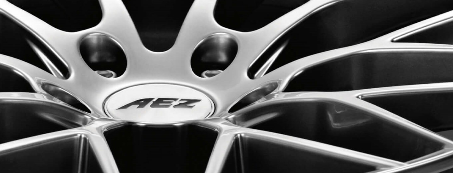 AEZ Antigua high gloss alloy wheel cross-spoke full above 