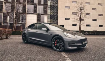DEZENT AR black Tesla Model 3 front