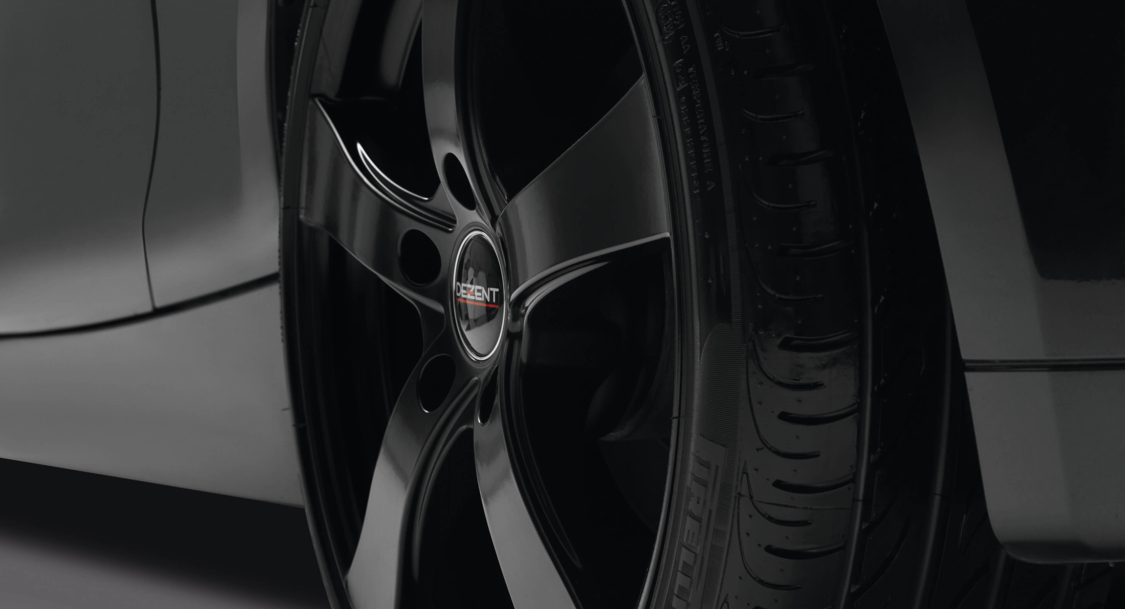 DEZENT RE dark alloy wheel 5-spoke-design